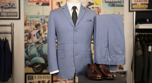 Collection of Mod suits for Brighton, featuring slim-fit vintage-inspired designs in a boutique near the seaside.