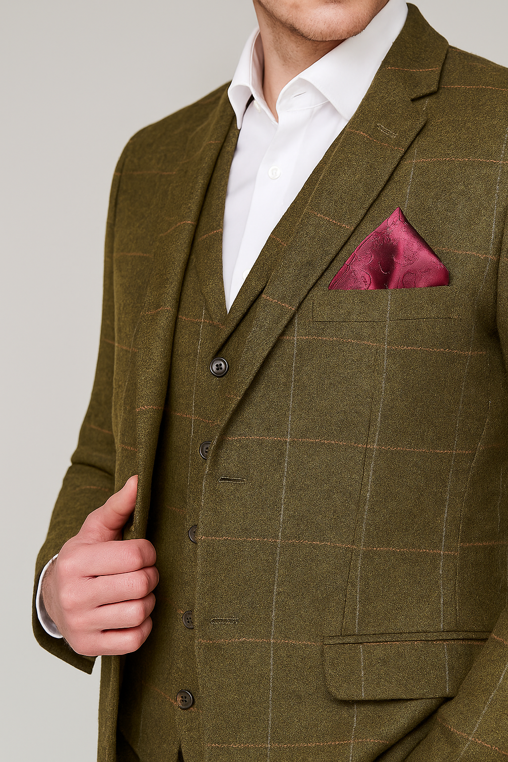 green tweed suit