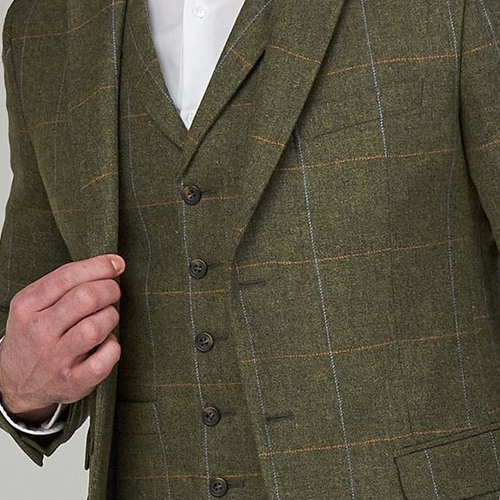 green tweed suit